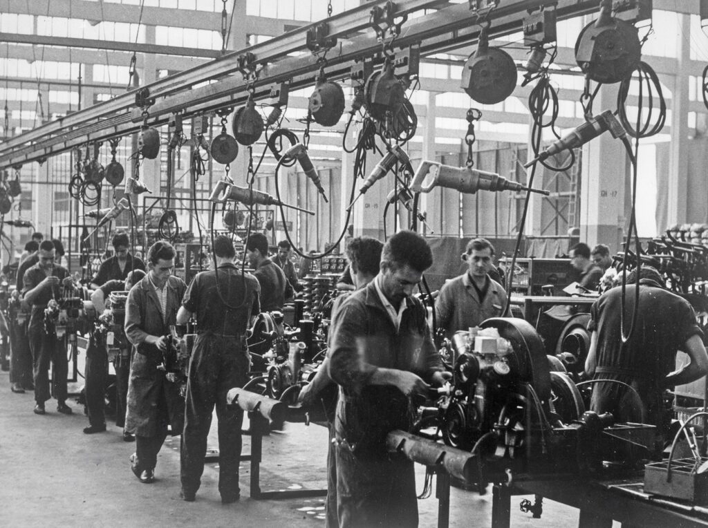 Workers assembling engines at the Anchieta factory of Volkswagen do Brasil in 1964